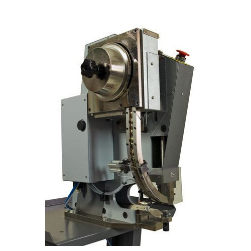 HOPPER FED VENT ATTACHING MACHINE   